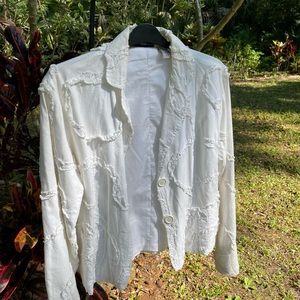 White jacket with two buttons.